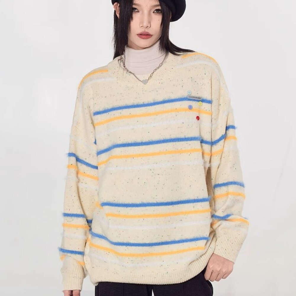 Striped contrasting crew-neck knitwear sweater buttons over a loose top